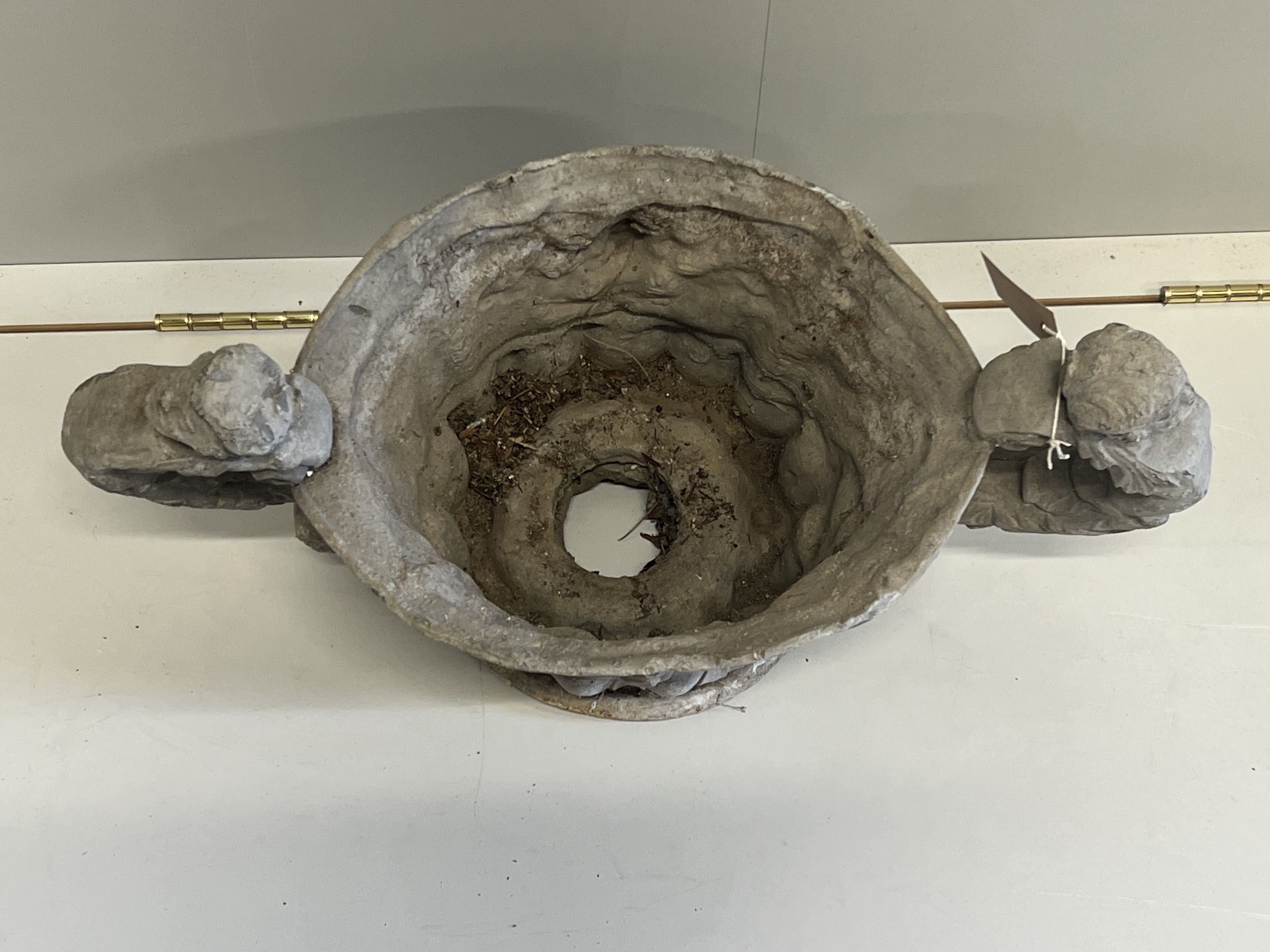 A Victorian lead twin handled urn, width 63cm, height 36cm